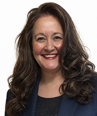 Michelle Rodriguez, Optimus Health Care staff member, smiling professional headshot